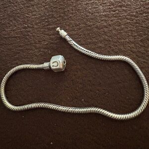 Chamilia Sterling Silver charm  Bracelet. 8.5”
Like Pandora different brand